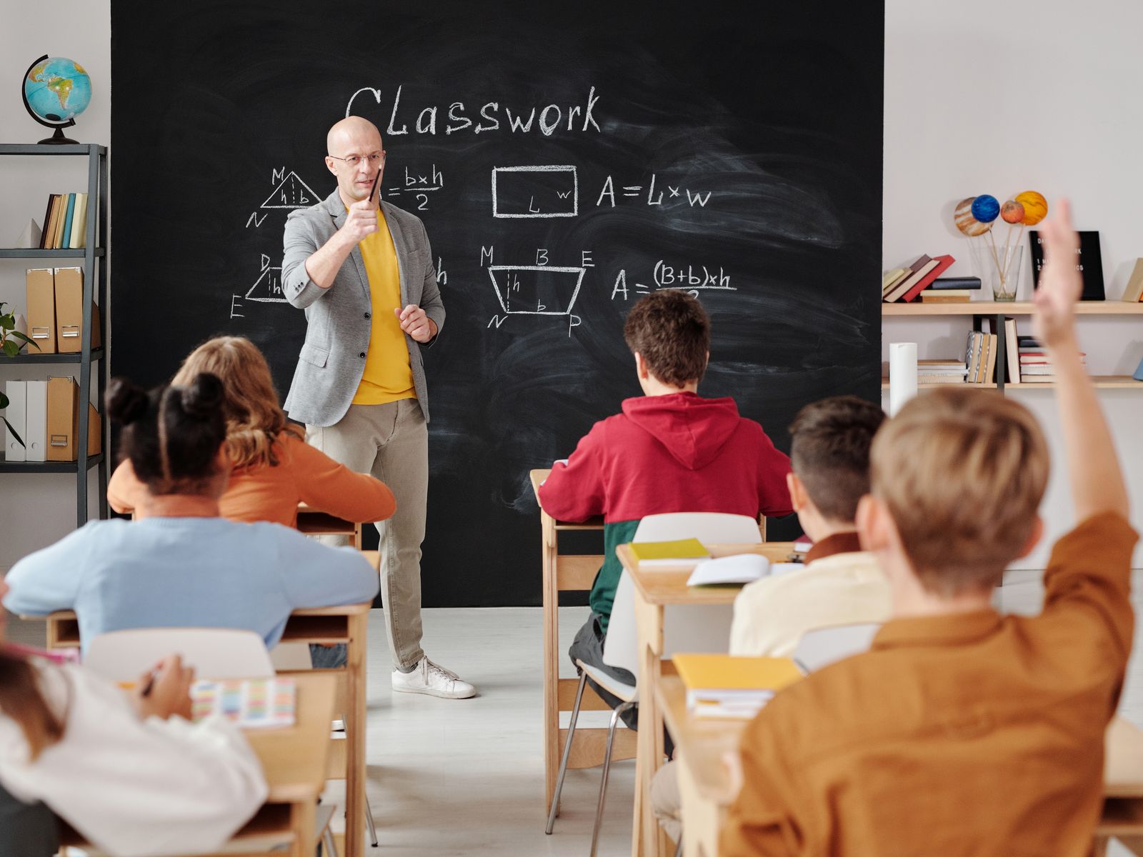 A teacher and student in a one-to-one conversation
